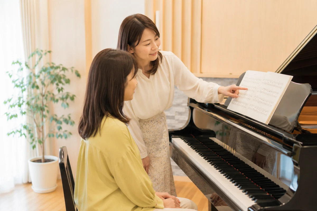 ピアノのレッスンを楽しむ姿